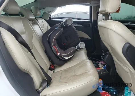 2015 Ford Fusion Titanium z USA, uszkodzony, nr VIN 3FA6P0K99FR310518